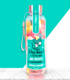 Botella con chuches para regalar a un niño que se le ha caído un diente.