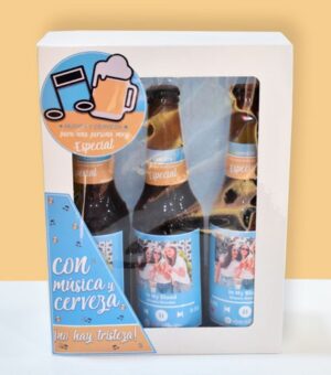 Estuche de cerveza con 3 cervezas Estrella Galicia Gran reserva 1906 y Escáner Spotify para escuchar tu canción favorita.