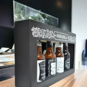 Estuche con 4 cervezas Premium.