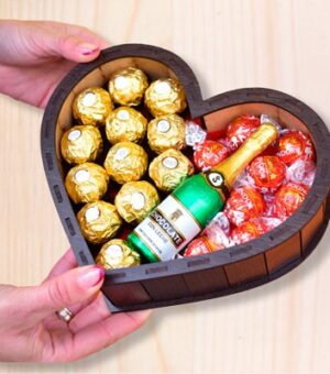Caja en forma de corazón con bombones Lindor y Ferrero Rocher.