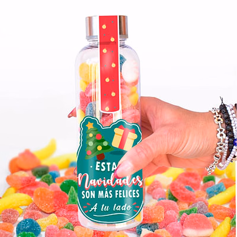 Botella de chuches con mensaje navideño.