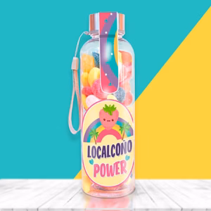 Botella con chuches para regalar a una amiga, mensaje localcoño.