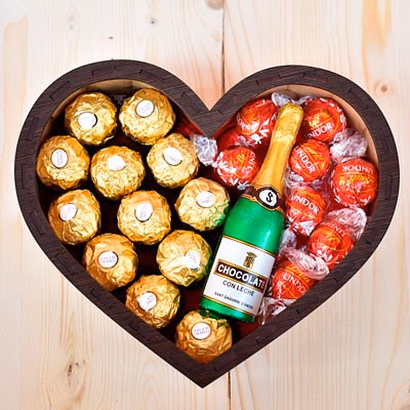 Caja en forma de corazón con bombones Lindor y Ferrero Rocher.